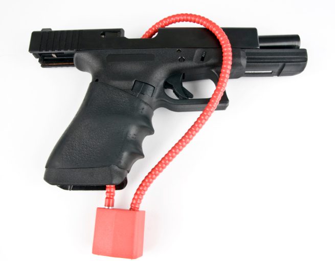 Gun with safety cable lock