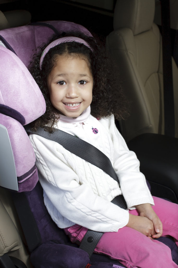 Child in booster seat